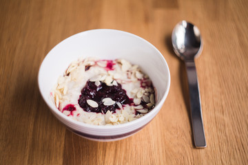 Oatmeal with jam and nuts