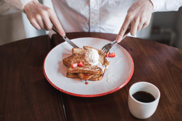 man eating French toasts