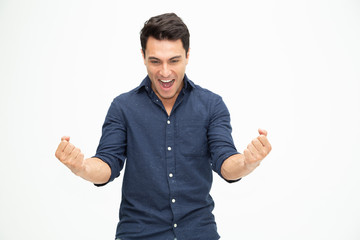 Handsome man with surprise and shocked facial expression over white background