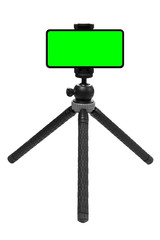 Smartphone device on tripod, isolated on white with green screen area for image placement