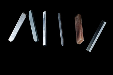 Files of different stiffness and scope on a black background, isolate.