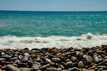 sea coast with pebble beach and waves