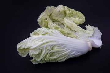 fresh chinese cabbage vegetable isolated on black background