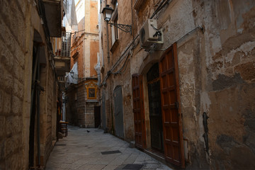 Typical picturesque narrow street in the Old Town of Bari, Puglia region, Southern Italy.