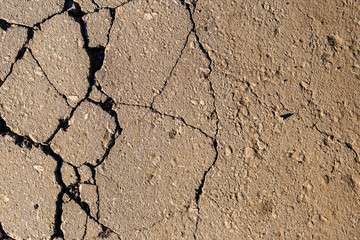 cracked asphalt on the road
