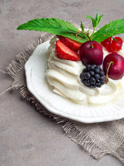 Pavlova: A Cake Made From Layers of Meringue, Whipped Cream, and Fresh Berries