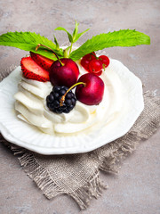 Pavlova: A Cake Made From Layers of Meringue, Whipped Cream, and Fresh Berries