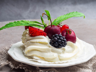 Pavlova: A Cake Made From Layers of Meringue, Whipped Cream, and Fresh Berries
