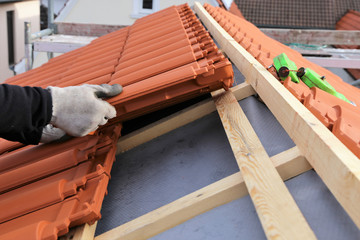 New roof covering in progress - obrazy, fototapety, plakaty