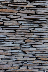 wall made of flat stone plates