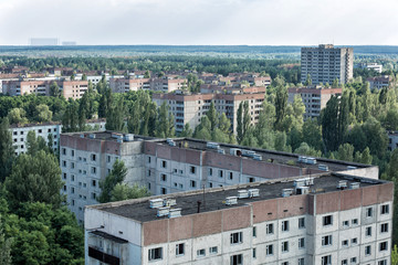 Fototapeta premium View from roof of 16-storied apartment house in Pripyat town, Chernobyl Nuclear Power Plant Zone of Alienation, Ukraine