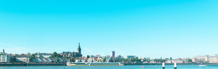 Obraz premium The Waal in front of the Dutch city of Nijmegen , Holland