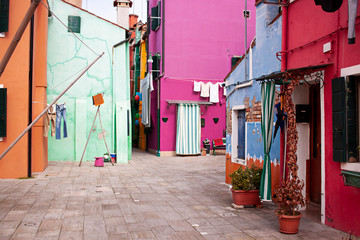 Fototapeta na wymiar Colorful building in Burano island in Venice. Italian street