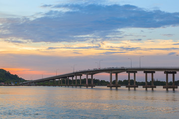 Fototapeta na wymiar Beautiful long bridge in Chantaburi province at sunset twilight, Thailand