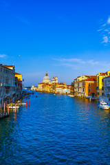 Fototapeta na wymiar Venice. Cityscape image of Grand Canal in Venice, with Santa Maria della Salute Basilica in the background.