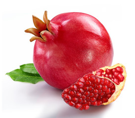 pomegranate with slice and leaf isolated white background