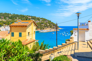 Houses in Llafranc village overlooking beautiful sea bay, Costa Brava, Spain