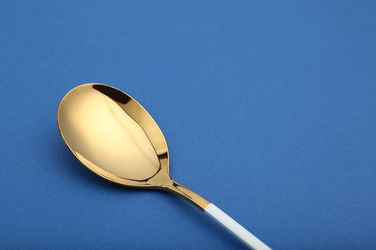 Clean tablespoon and space for text on color background