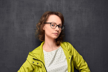 Portrait of girl looking haughtily at camera