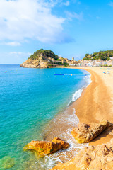 Blue azure sea and sandy beach view in Tossa de Mar, Costa Brava, Spain