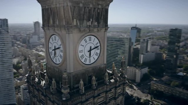 Aerial view of the clock with city coat of arms on historic Palace of Culture and Science in the centre of Warsaw, Poland