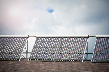 Solar glass tube hot water panel array on a roof