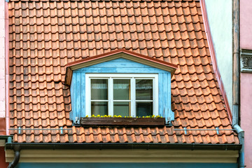 Attic window on the roof.