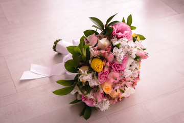 Rustic bridal bouquet with colorful roses. Typical Brazilian bridal bouquet with colorful floral arrangement.