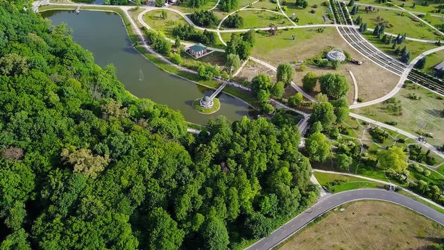 aerial view of beautiful park with lake, aerial view of park in Feofania in Kiev, Park with lakes forest trees, Feofania park in Ukraine, Kyiv, Flight back over the beautiful park with lakes and the r
