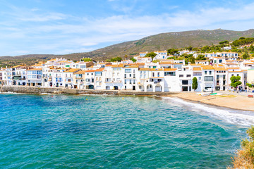 Fototapeta premium White houses and blue sea in Cadaques port, Costa Brava, Spain