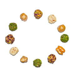 Healthy vegan snack circle. Sugar-free. Dry peach balls with pistachio and peanut cover. Cevizli sucuk (candy sausage). Dried apricots stuffed with almonds. Isolated. 