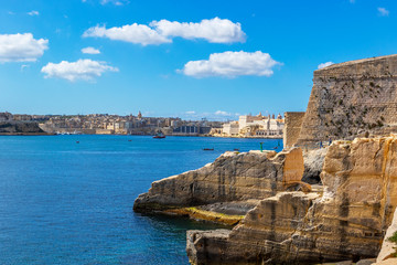 Fototapeta na wymiar Ancient fortifications of Valletta, grand harbour Malta