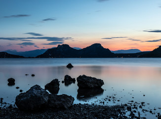sunset on coast of sea
