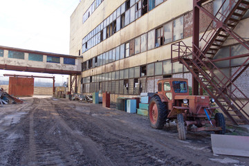  Old industrial building. Abandoned production. Demolition work of an old industrial building.