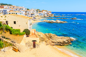 Amazing beach in Calella de Palafrugell, scenic fishing village with white houses and sandy beach...