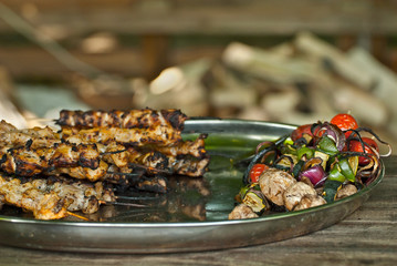 Different types of fried meat on the table. BBQ at the festival.