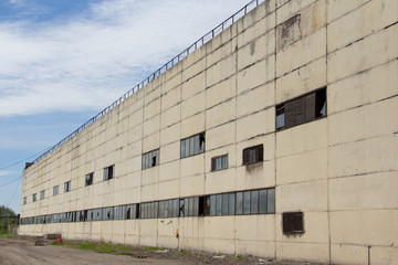  Old industrial building. Abandoned production. Demolition work of an old industrial building.