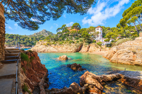 Coastal path along sea in picturesque Fornells village, Costa Brava, Spain