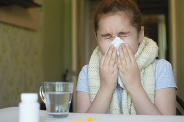 little girl with fever and sneezes
