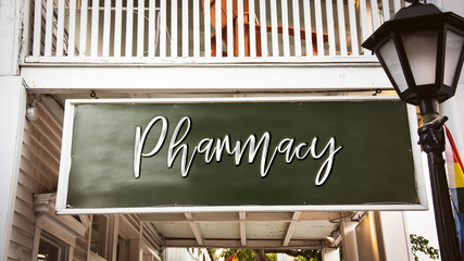 Obraz premium Street Sign to Pharmacy
