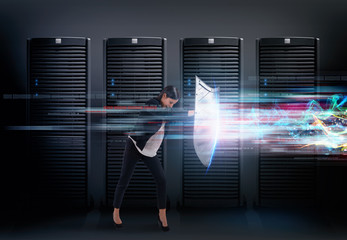 Concept of safety in a data center room with database server. Woman with shield defends against...