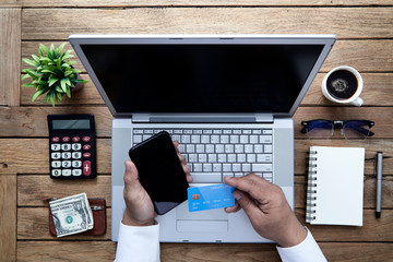 Fototapeta na wymiar shopping online smart phone and bank card