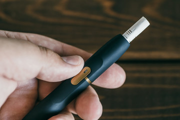 Modern hybrid cigarette device without burning tobacco, alternative smoking