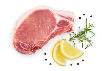 sliced raw pork meat with rosemary and lemon isolated on white background. Top view. Flat lay