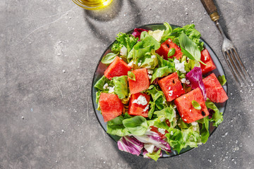 Summer salad with watermelon and salad leaves