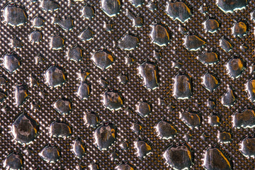 Silver Reflective Fabric Material Texture with Imitation of Water Droplets . Abstract Background of a Reflector Fabric for Lighting Equipment.