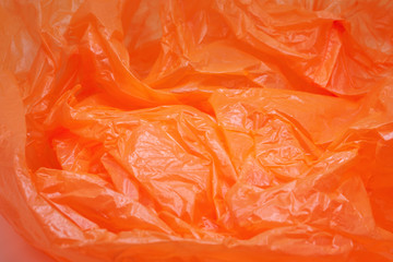 Orange Color Plastic Bag Texture. Abstract Wrinkled Background of Plastic Garbage