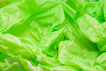 Green Plastic Bag Texture. Abstract Wrinkled Background of Plastic Garbage