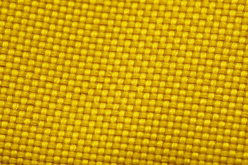 Yellow Nylon Fabric Texture Background. Thick Fabric for Backpacks and Sports Equipment