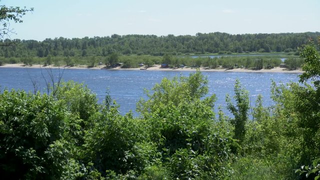 View of the river and hills from behind the trees